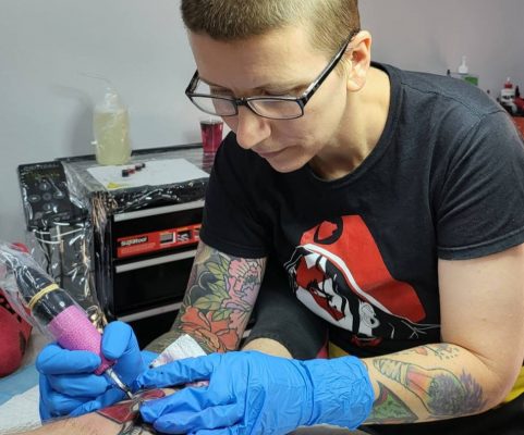 Wild Honey Tattoo Studio - Dan working on client leg